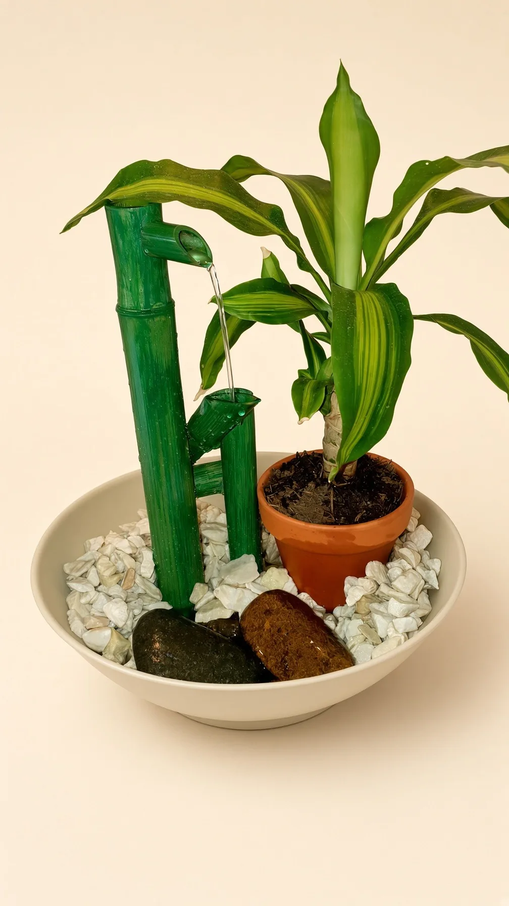 Péndulo verde con palo de agua
